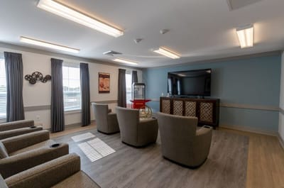 Common area with comfortable seating and a TV