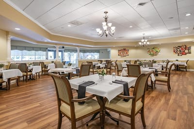 Elegant dining room setup with tables and chairs