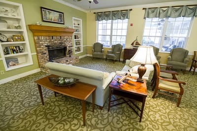 Cozy common area with a fireplace and seating