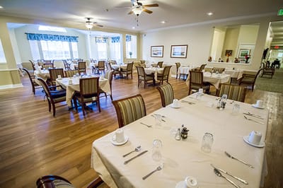 Dining room with tables set for meals