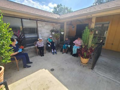 Residents enjoying time outdoors in a social setting