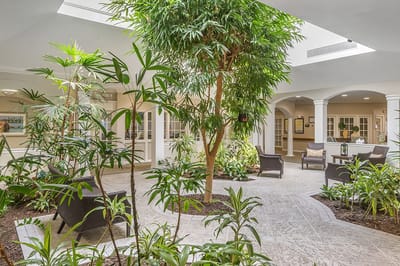 Indoor common area with plants and seating