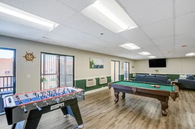 Interior activity room with games and seating