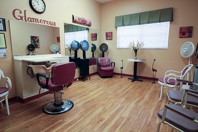 Interior view of a salon area with styling chairs