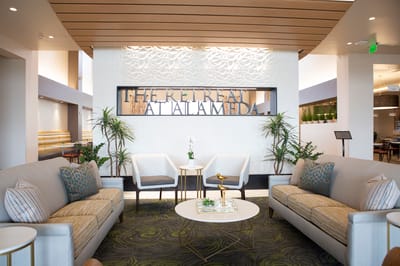Bright and inviting common area with seating and plants
