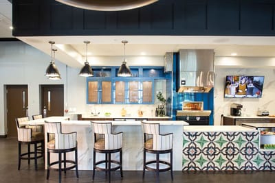 Interior view of the facility's amenity space with a bar