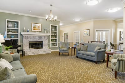 A cozy common area in the facility with seating and decor