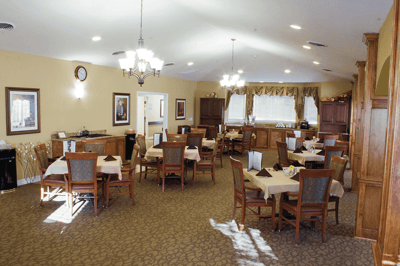 Dining area with tables and chairs set up