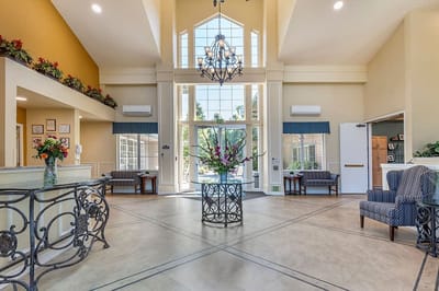 Interior view of a common area with seating and natural light