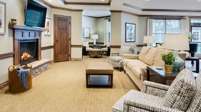 Cozy common area with seating and a fireplace