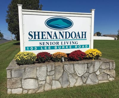 Signage for Shenandoah Senior Living with flowers