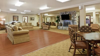 Common area lounge with seating and fireplace