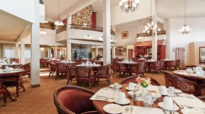 Elegant dining room layout with set tables