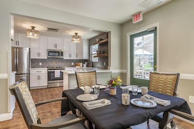 Dining area with a table set for meals