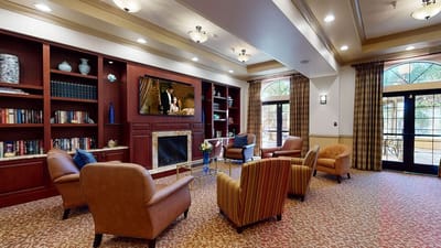 Interior common area with comfortable seating and a TV