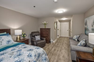 Cozy private resident room with floral bedding