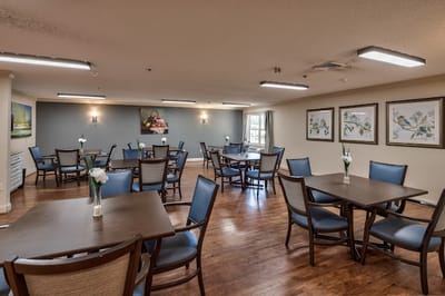 Bright dining area with tables and chairs