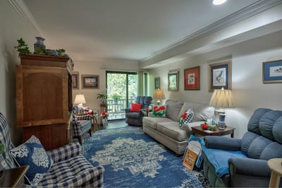 Cozy lounge area with comfortable seating and decorations