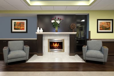 Comfortable common area with a fireplace and seating