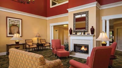 Bright and welcoming lobby with seating and fireplace