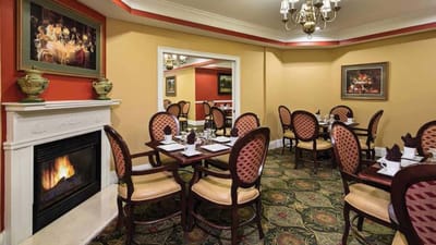 Elegant dining area with tables and chairs