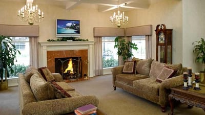 Cozy common area with comfortable seating and a fireplace