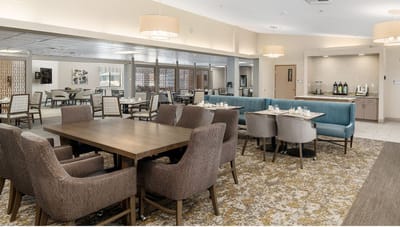 Bright dining area with tables and seating