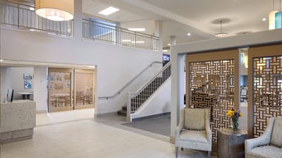 Bright common area with seating and decor