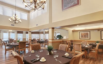 Dining area with tables set for meals