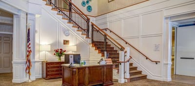 Interior view of the facility's reception area and staircase
