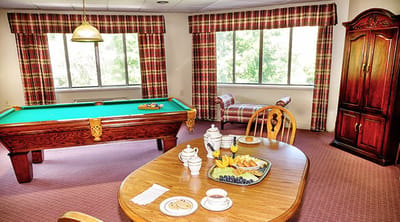 Cozy common area with a pool table and refreshments