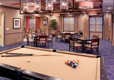 Interior view of a pool table area in a lounge