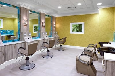 Well-lit salon area with styling stations