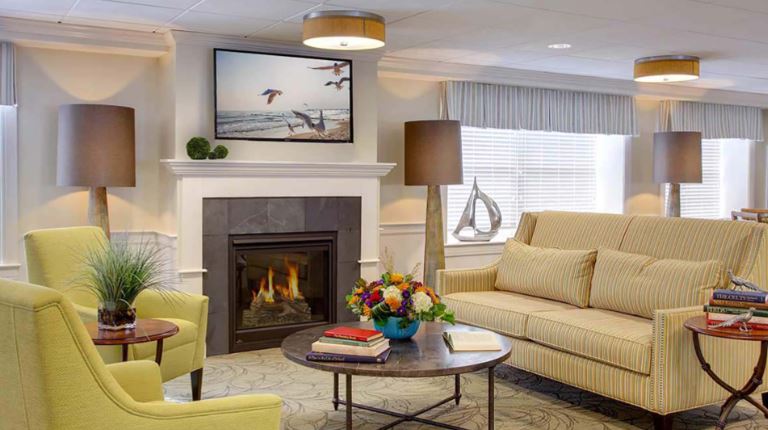 Cozy common area with seating and fireplace