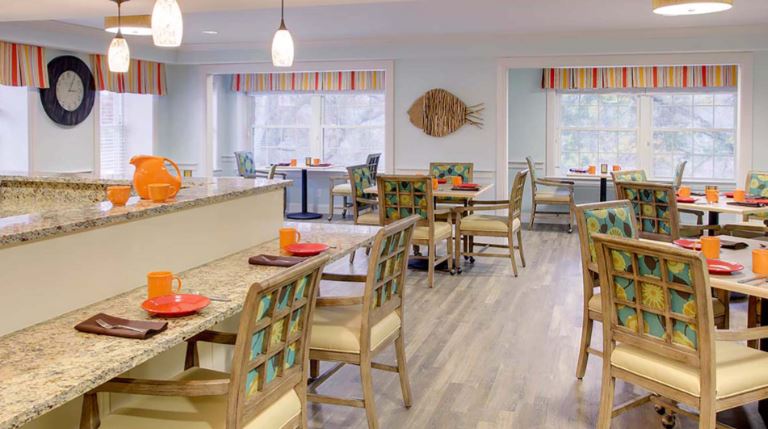 Bright dining area with colorful decor and tables