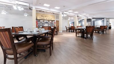 Dining room with tables set for meals