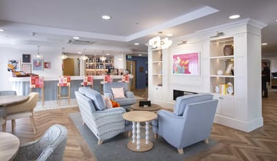 Well-furnished common area with cozy seating