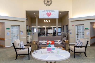 Bright common area with seating and decorations