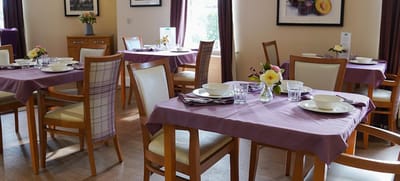 Dining area setup with tables and bowls