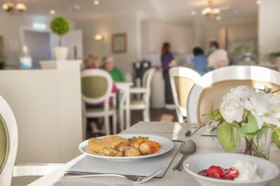 Dining area with a meal served on the table