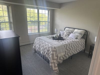 Cozy private room with a bed and window light