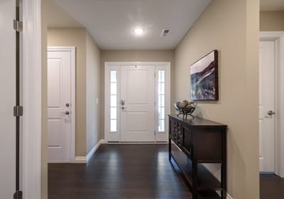 Bright hallway leading to the front door