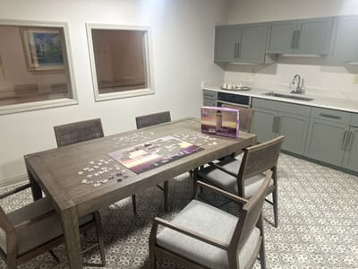 Bright common area with a puzzle on the table