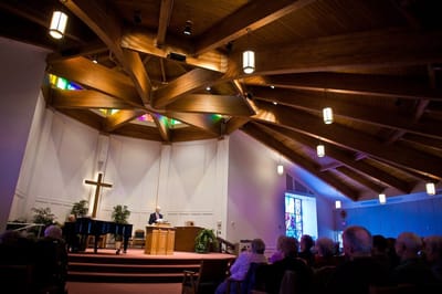 Residents attending a service in a chapel setting