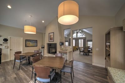 Bright common area with tables and chairs