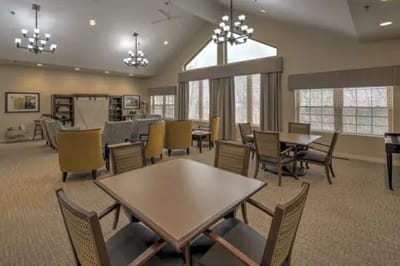 Bright common area with seating and natural light