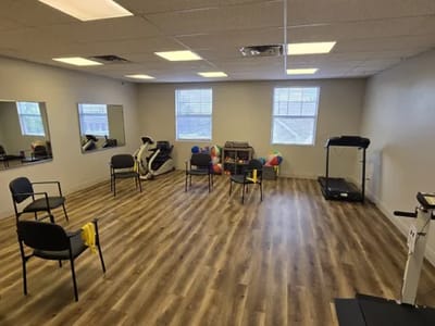 Bright interior of an exercise room with equipment