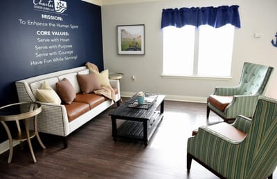 Bright common area with seating and decor