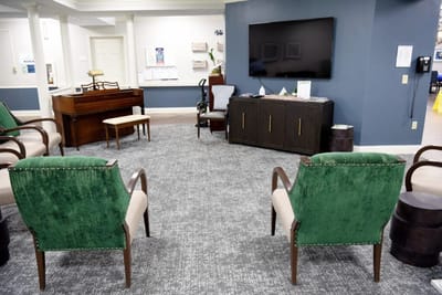 Common area with seating and a piano
