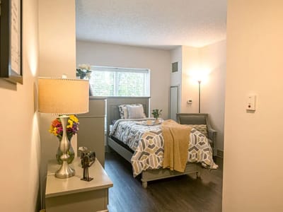Cozy interior view of a resident room with soft lighting